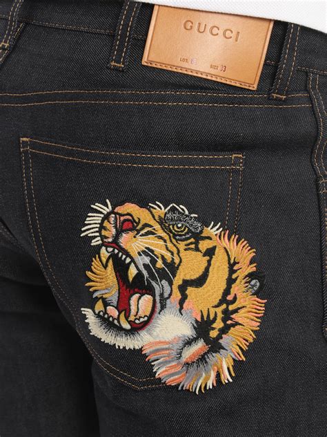 jeans gucci uomo tigre|gucci jeans net a porter.